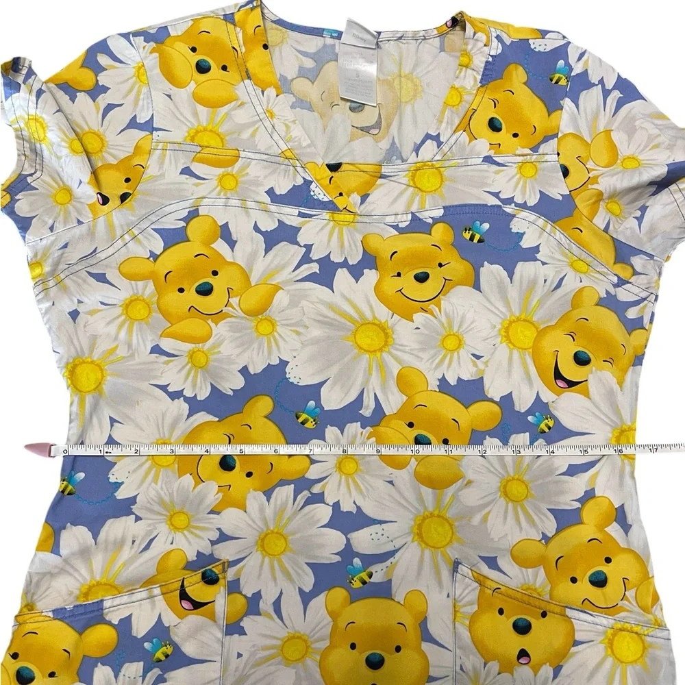 Disney Blue and Yellow Floral Print Adult Woman’s Scrub.
Size S - Picture 10 of 13